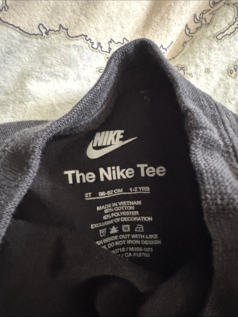 Nike Black Long-Sleeve 'Just Do It' Graphic Tee with Colorful Sneaker Character